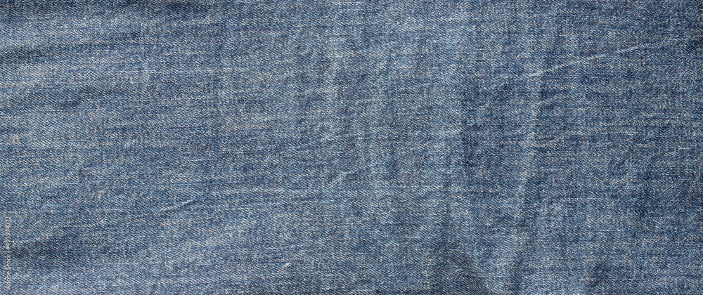 texture of blue jeans denim fabric background