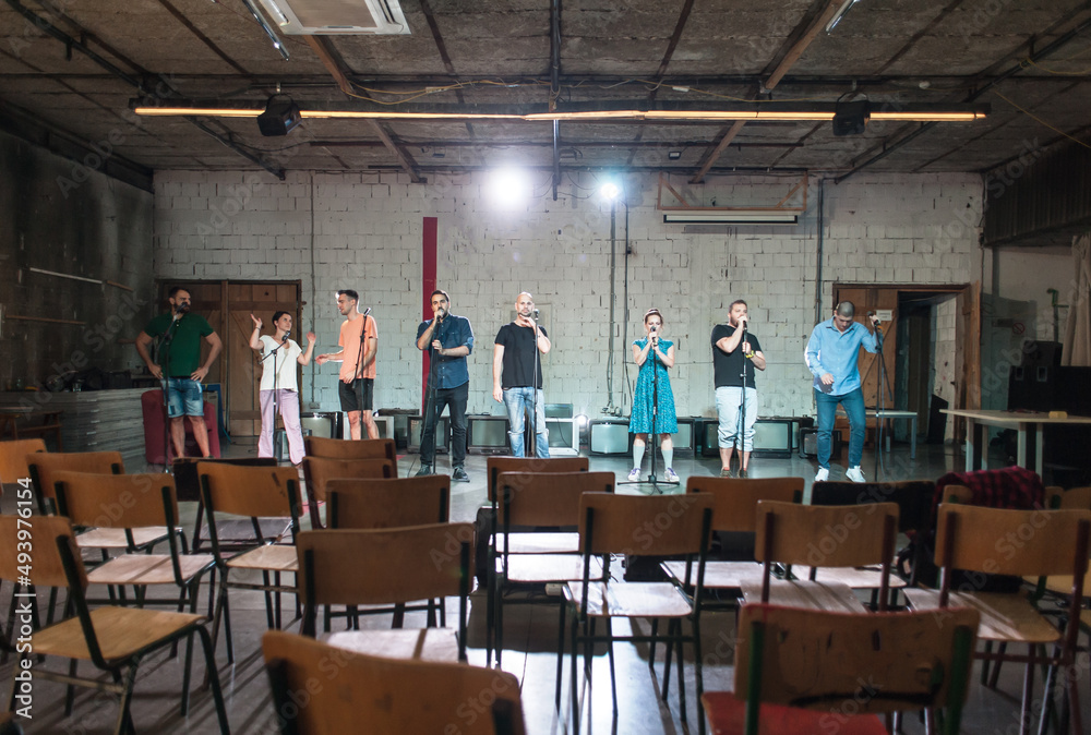 Behind the scenes. Rehearsal at theatre with large actors group Behind the scenes. Rehearsal at theatre with large actors group