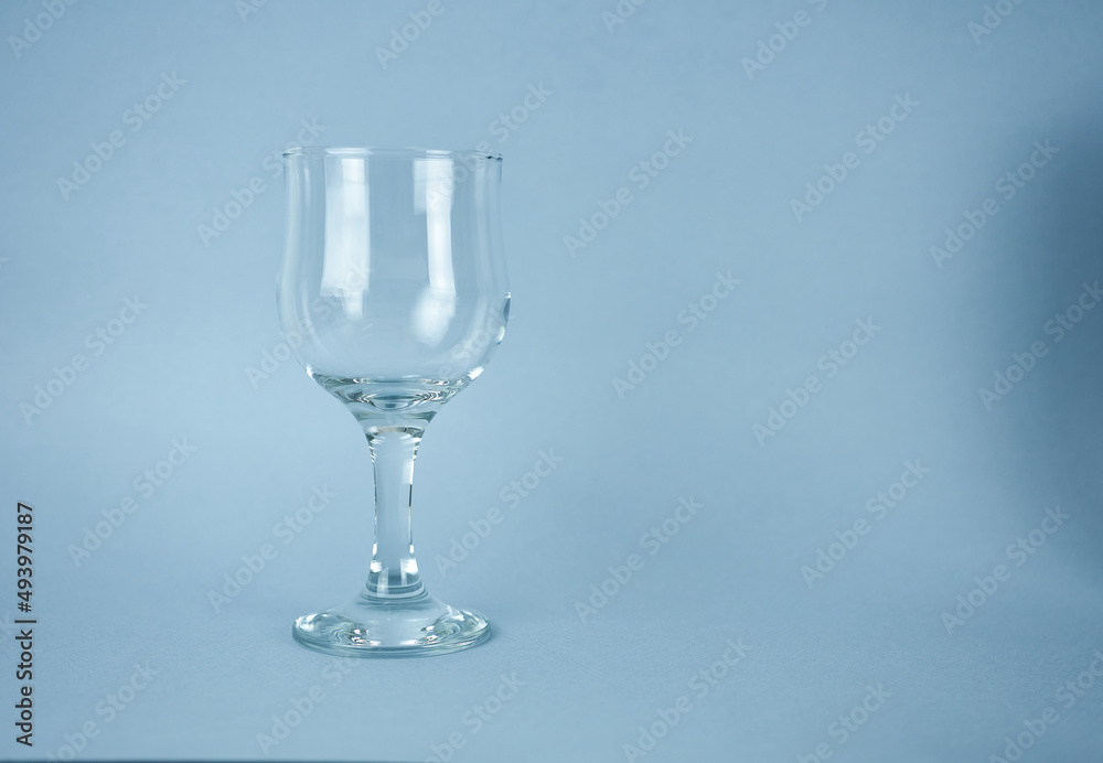 wine glass on a blue background wine glass on a blue background