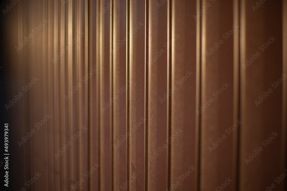 Texture of steel fence. Profile sheet is brown. Fence details. Texture of steel fence. Profile sheet is brown. Fence details.
