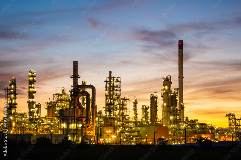 Oil​ refinery​ and​  plant and tower column of Petrochemistry industry in oil​ and​ gas​ ​industrial with​ cloud​ blue​ ​sky the morning