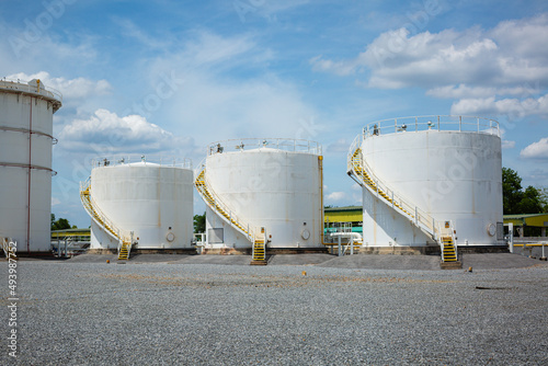 The row of small white tanks for petrol station and refinery