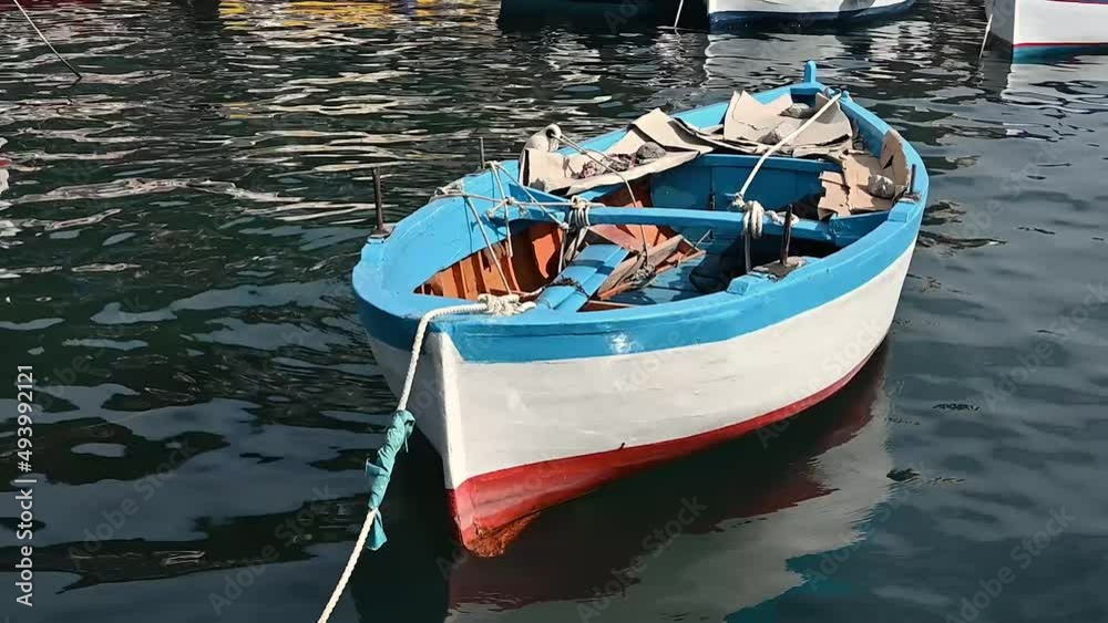 horizontal close up detail old boat in cetara amalfi coast italy europe - harbor boats wood blue red white - relaxed calm pause - nobody no people horizontal close up detail old boat in cetara amalfi coast italy europe - harbor boats wood blue red white - relaxed calm pause - nobody no people