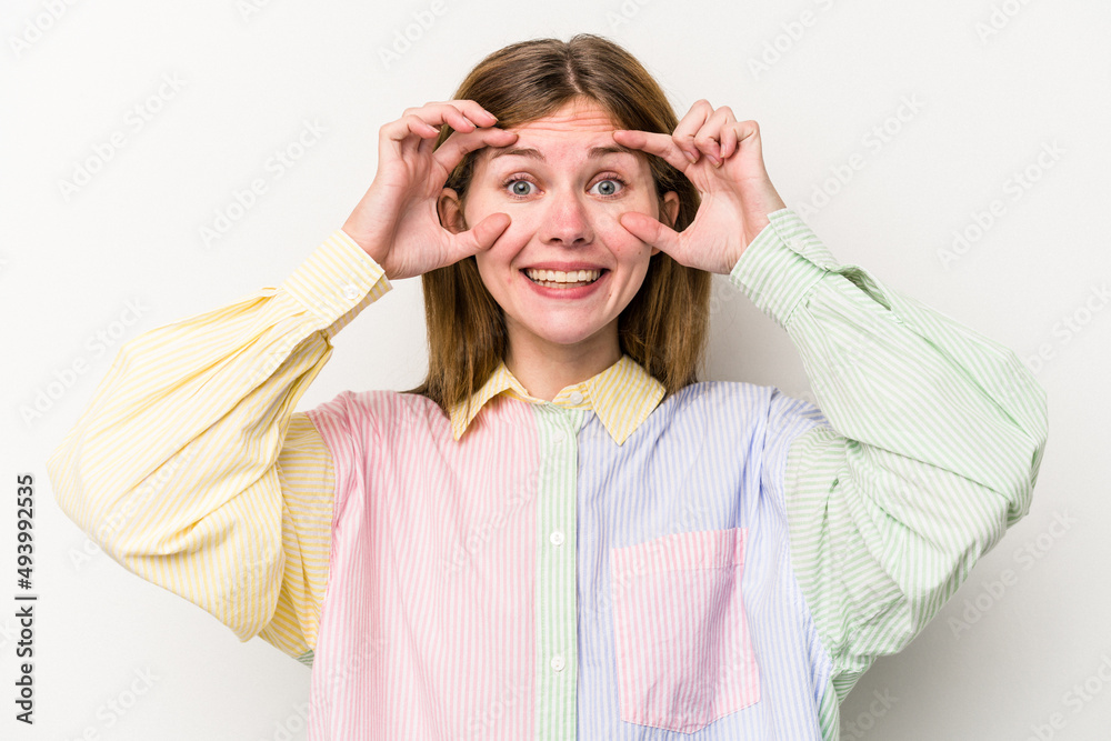 Young russian woman isolated on white background keeping eyes opened to find a success opportunity. Young russian woman isolated on white background keeping eyes opened to find a success opportunity.