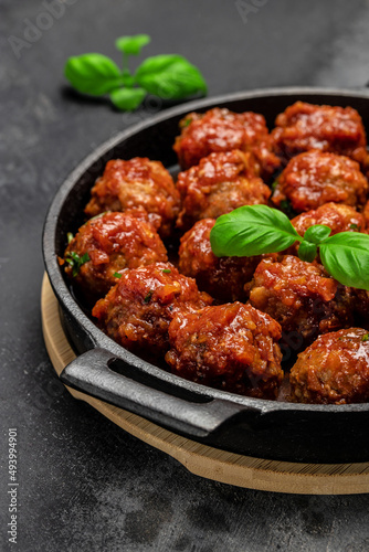 meatballs. Traditional spicy meatballs in sweet and sour tomato sauce. Restaurant menu, dieting, cookbook recipe vertical image. top view. place for text