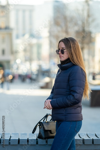 Woman walking on the street.
