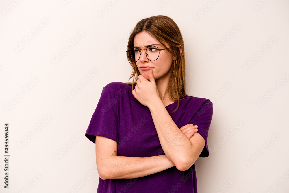 Young caucasian woman isolated on white background suffers pain in throat due a virus or infection. Young caucasian woman isolated on white background suffers pain in throat due a virus or infection.
