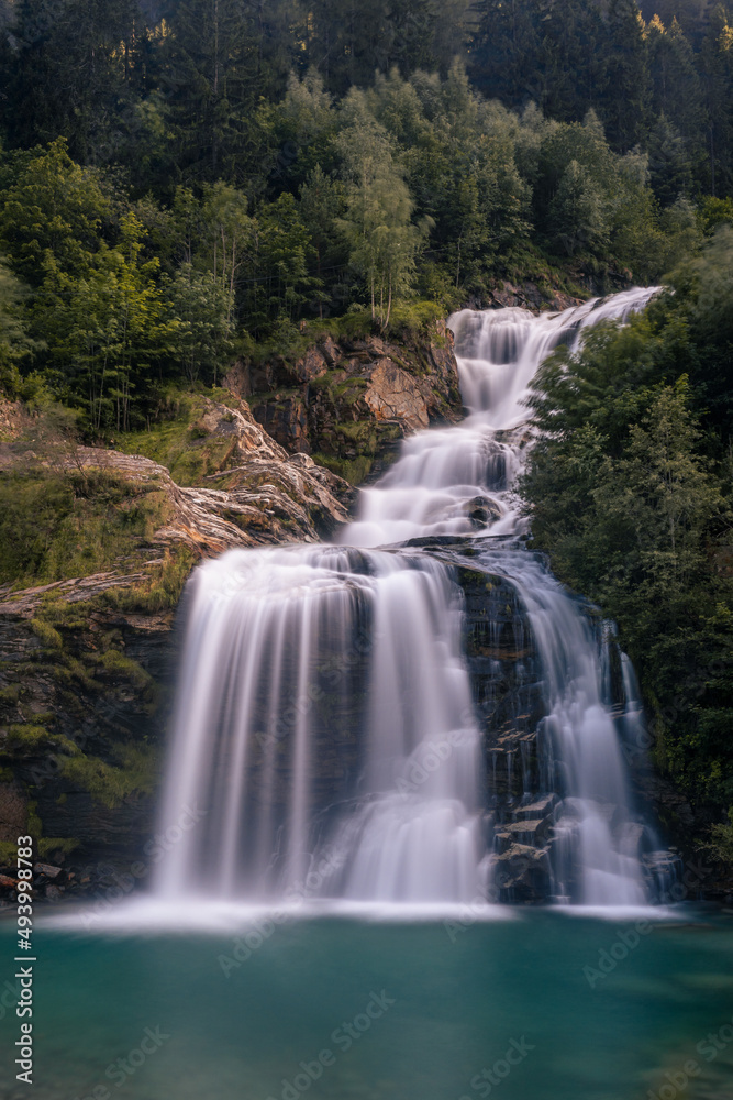 Fototapeta premium Close-up of the Piumogna waterfall in Faido, Ticino, Switzerland, photographed with a long exposure.
