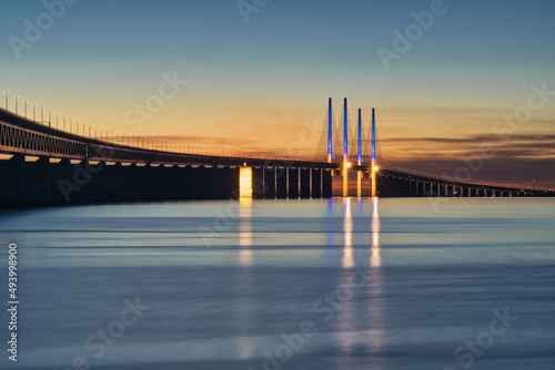 Fototapeta Naklejka Na Ścianę i Meble -  The Oresund Bridge between Denmark and Sweden at sunset