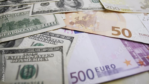 Footage from dissimilar cash banknotes of different states of the European Union and the United States of America