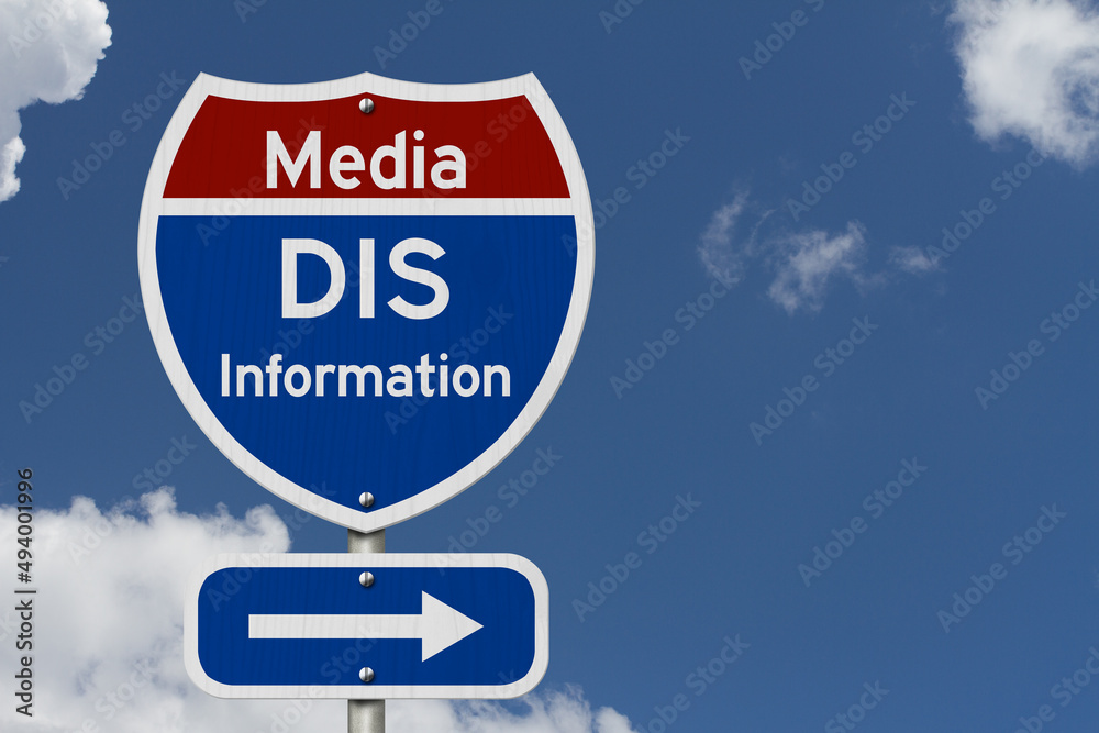 Media Disinformation message on a sign with sky Media Disinformation message on a sign with sky