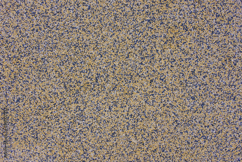 Interior rubber flooring material in yellow shade using in fitness ,gymnasium or playground for prevent accident. Close up of soft floor texture background.