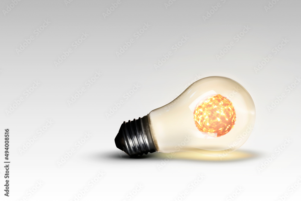 Light bulb on a white background with a Sun in it. Light bulb on a white background with a Sun in it.