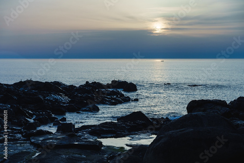 Sunset on a rocky coastline