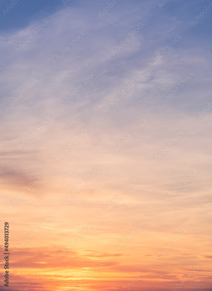 Dusk,Sunset orange sky twilight in the evening with colorful yellow sunlight and dark blue, majestic sky vertical. Dusk,Sunset orange sky twilight in the evening with colorful yellow sunlight and dark blue, majestic sky vertical.