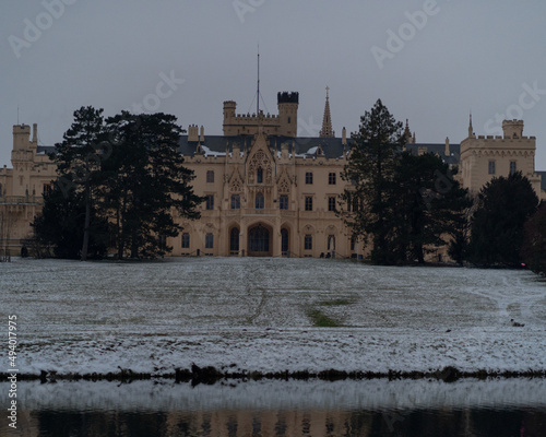 Castle Lednice on a snowy and gloomy day photo