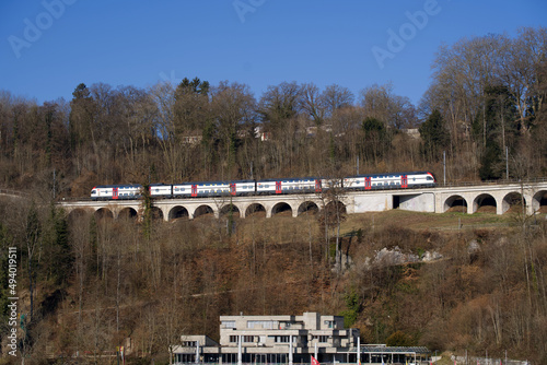 Railway viaduct at Neuhausen am Rheinfall on a sunny spring day near the famous Rhine Falls. Photo taken March 5th, 2022, Neuhausen am Rheinfall, Switzerland. photo