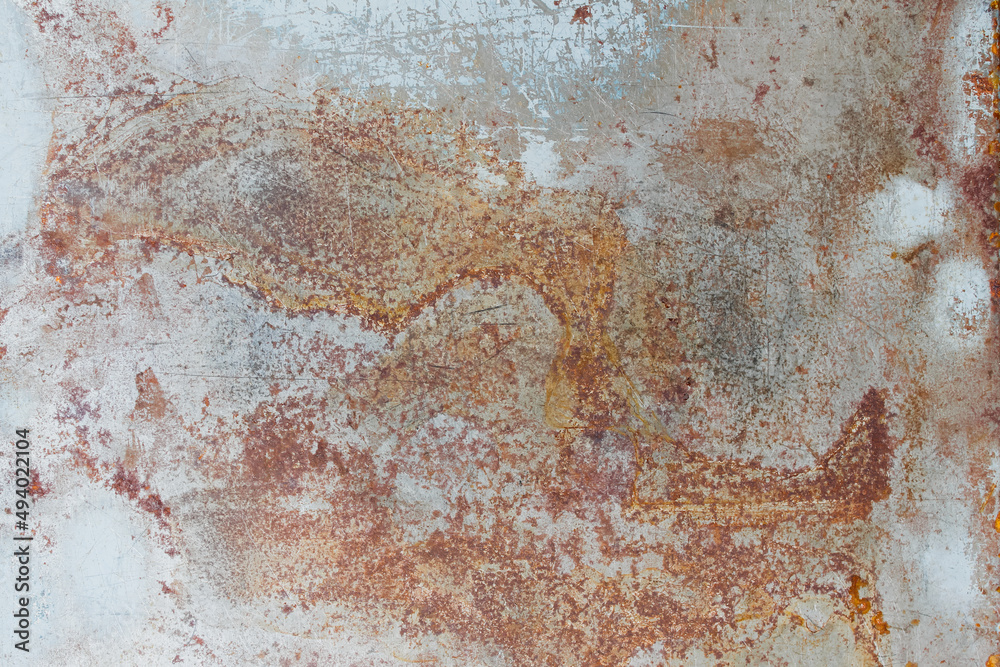 Rusty Metal Background Image is metal that has been corroded by moisture to the surface causing iron rust to form on the surface of the object. Rough patterns and surfaces are caused by corrosive rust