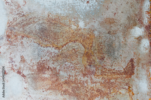 Rusty Metal Background Image is metal that has been corroded by moisture to the surface causing iron rust to form on the surface of the object. Rough patterns and surfaces are caused by corrosive rust