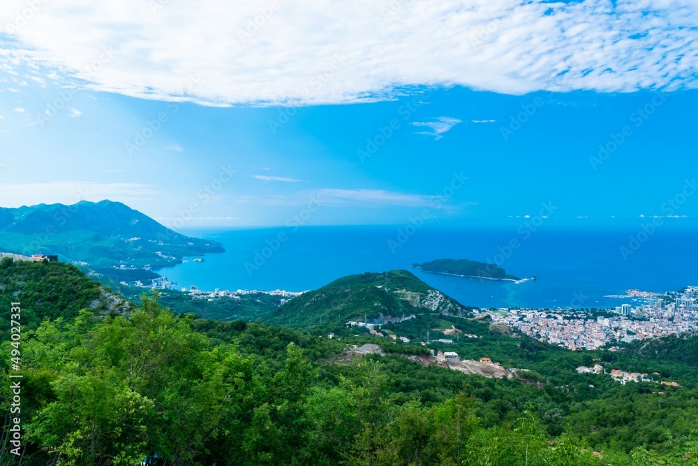 View from the top on Budva Riviera. The coast from Sveti Stefan to the cities of Becici and Budva on the Adriatic Sea in Montenegro.