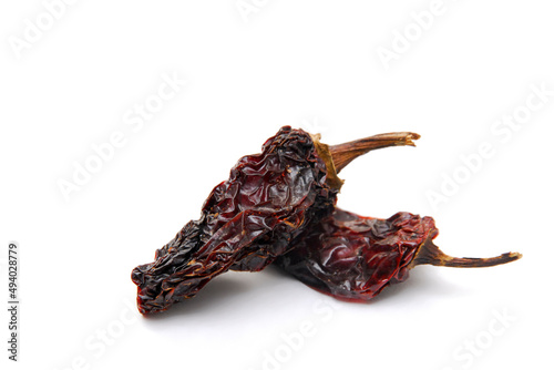 Morita dried chili, dried red chili pepper isolated on white background with space for text. dry morita chili photo