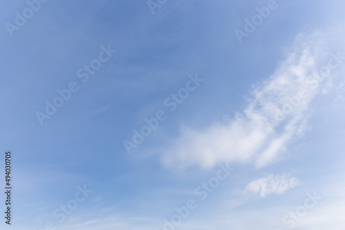 Blue sky with a light white cloud