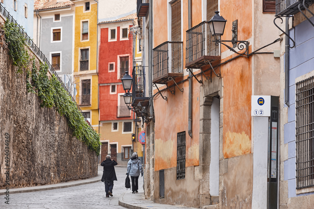 Traditional multi colored street in Cuenca world heritage old town. Spain