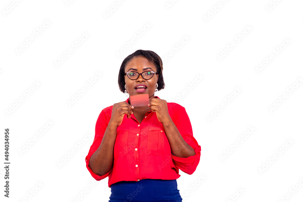 surprised adult business woman holding a credit card. surprised adult business woman holding a credit card.