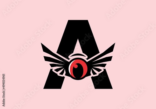 A initial letter with red eye wings