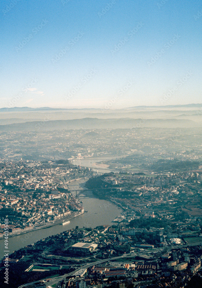 Aerial view of Porto city river Douro and the mountains