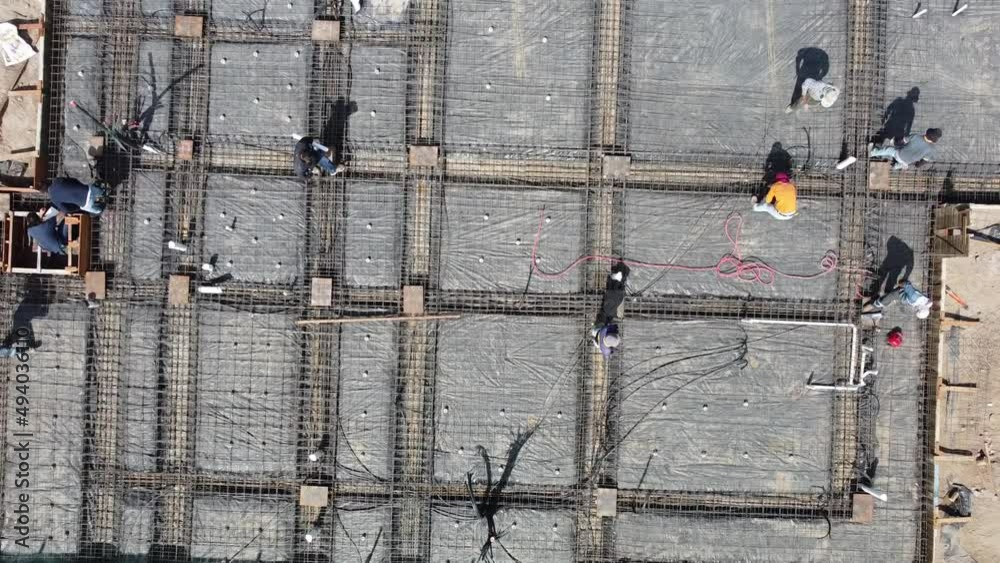 Cenital plane of a construction site with workers
