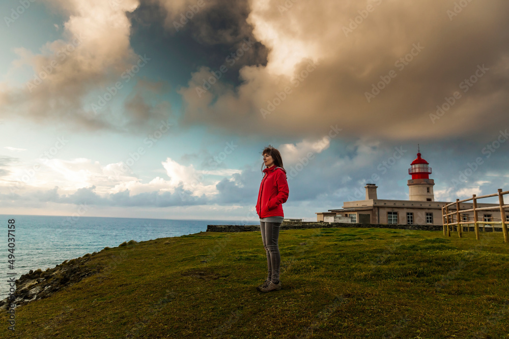 Watching the ocean near the lighthouse Watching the ocean near the lighthouse