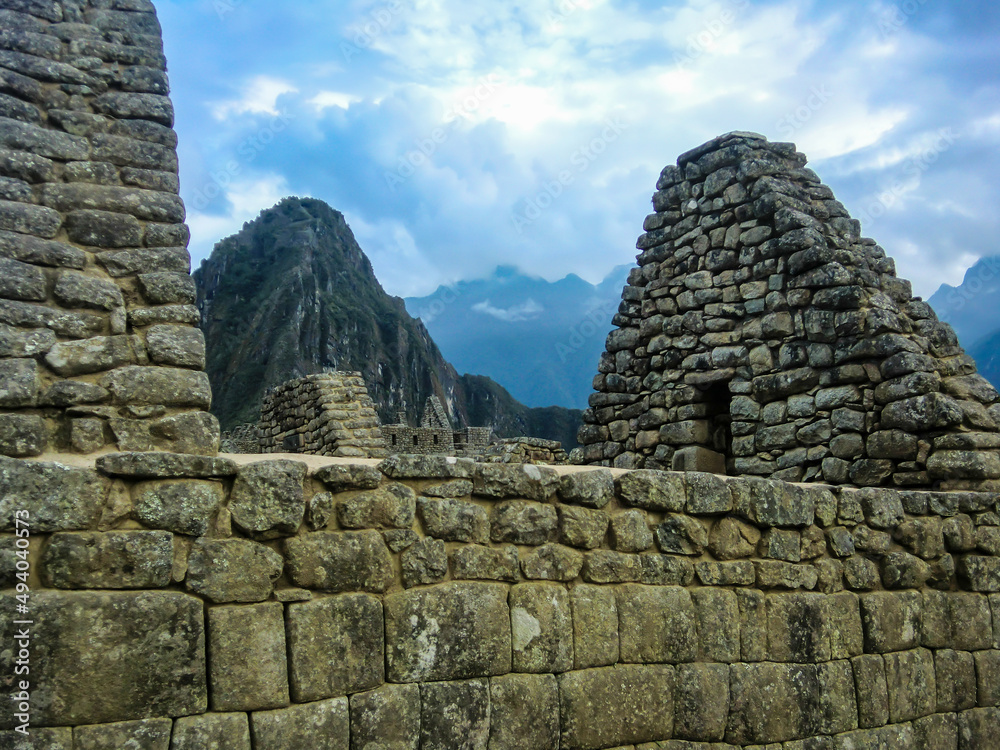 Carved stone structures from the Inca Empire at Machu Picchu - Cusco (Cuzco), Peru. Carved stone structures from the Inca Empire at Machu Picchu - Cusco (Cuzco), Peru.