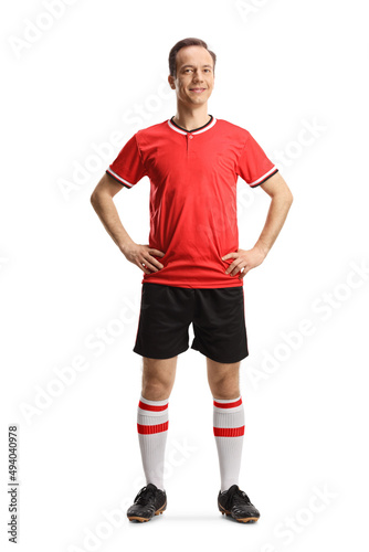 Man wearing football jersey and shorts
