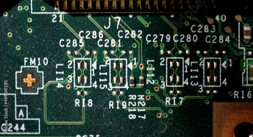 Old dusty and dirty laptop circuit board close-up photo