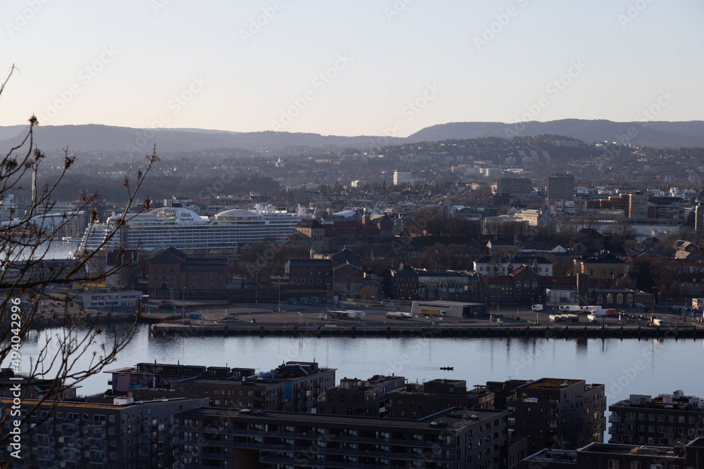 city skyline, sunset over the fjord,, Oslo, Norway