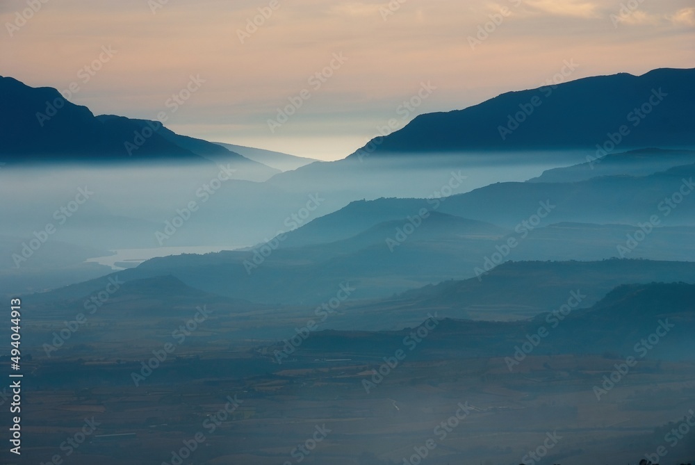 Haze falls over the hills of the Monsec gorge in Lleida Catalonia Spain