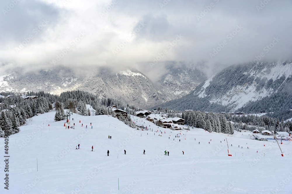 People skiing on a ski resort Courchevel