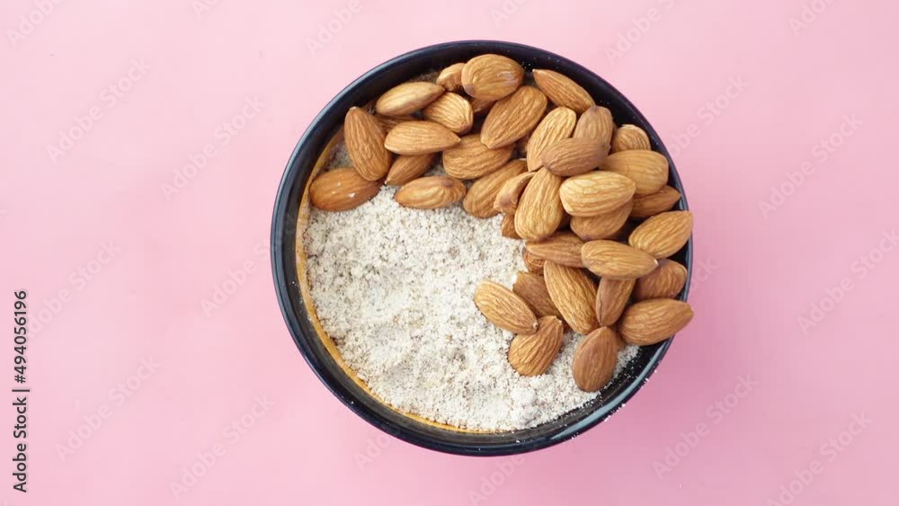 almond powder and almond in a jar on table, almond powder and almond in a jar on table,