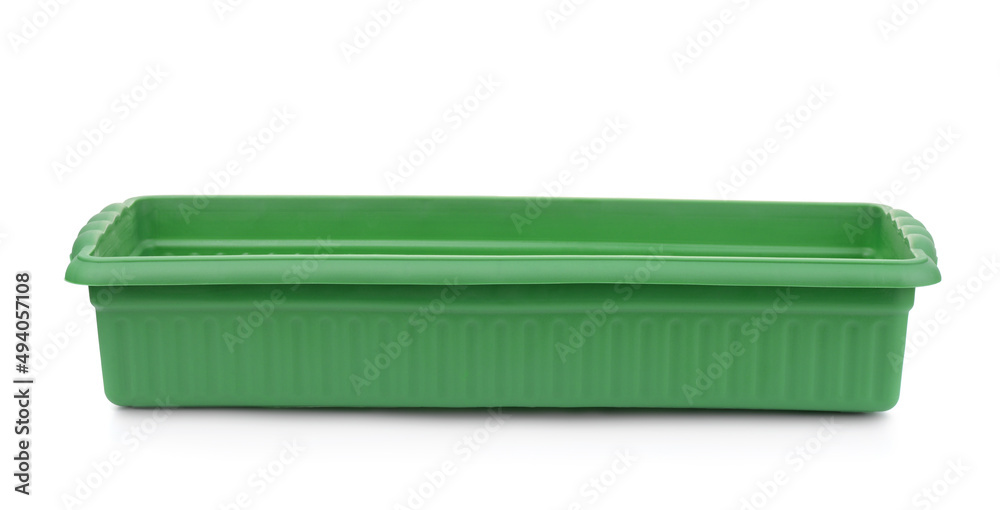 Front view of empty green plastic seedling tray Front view of empty green plastic seedling tray