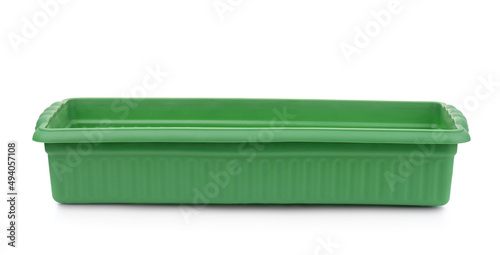 Front view of empty green plastic seedling tray