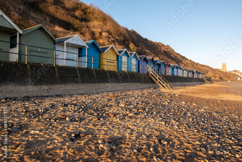 Murais de parede Charming beach huts by the sandy beach in Cromer, north Norfolk, UK
