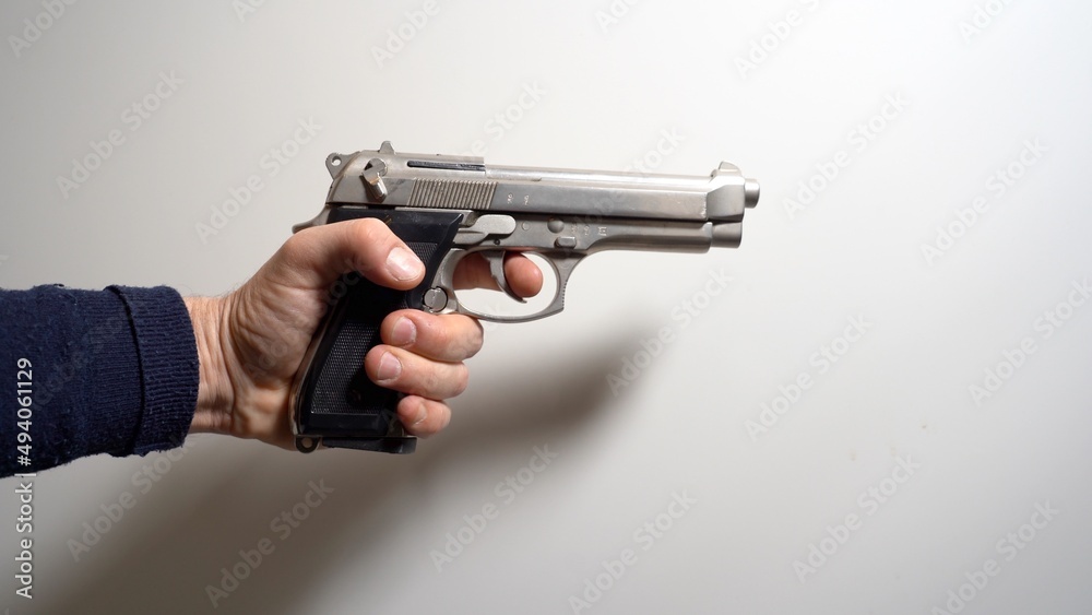 Personal gun pistol revolver at home for private security - personal defense weapon Personal gun pistol revolver at home for private security - personal defense weapon