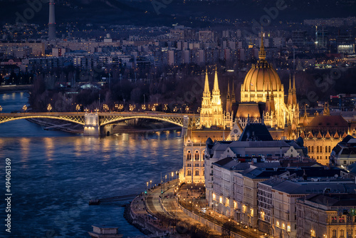 Elevated night view of the illuminated Hungarian Parliament Building at river Danube in Budapest 