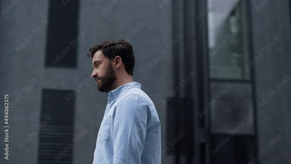 Portrait thoughtful businessman looking in camera. Frustrated manager pose alone Portrait thoughtful businessman looking in camera. Frustrated manager pose alone