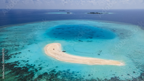 Beautiful shot a narrow island in the middle of sea. photo