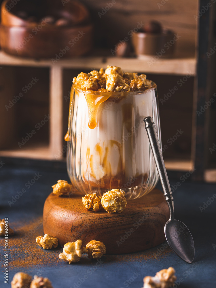 Balancing Milkshakes Popcorn milkshake beverage glass decorated with caramel salted syrup ...