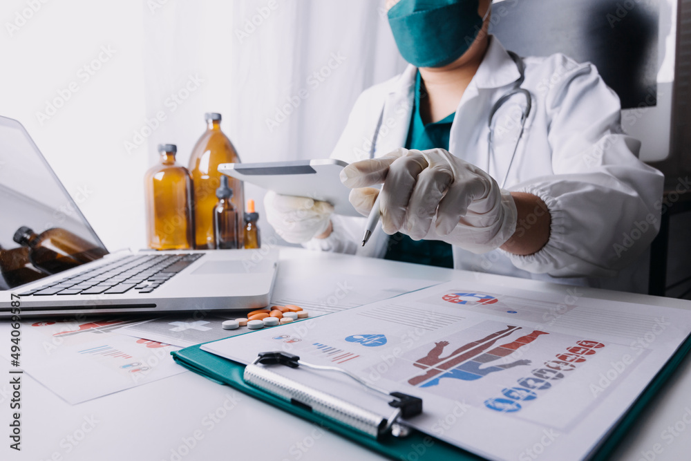 Medicine doctor using tablet with digital medical interface icons, Medical technology and network concept. Medicine doctor using tablet with digital medical interface icons, Medical technology and network concept.