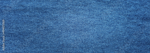 Close-up of blue denim jeans fabric texture background photo