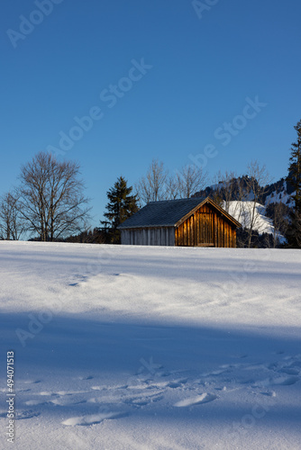 Beautiful little cottage in the middle of nothing. Breathtaking wintry dream landscape in the Swiss mountains in the canton of St. Gallen. © Philip